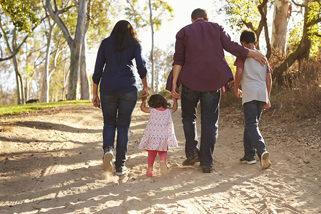 Acorn Recovery Projects - family walking through a forest