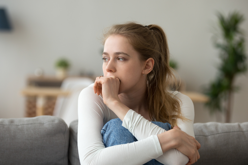 Motivational Programmes - Young woman looking anxious