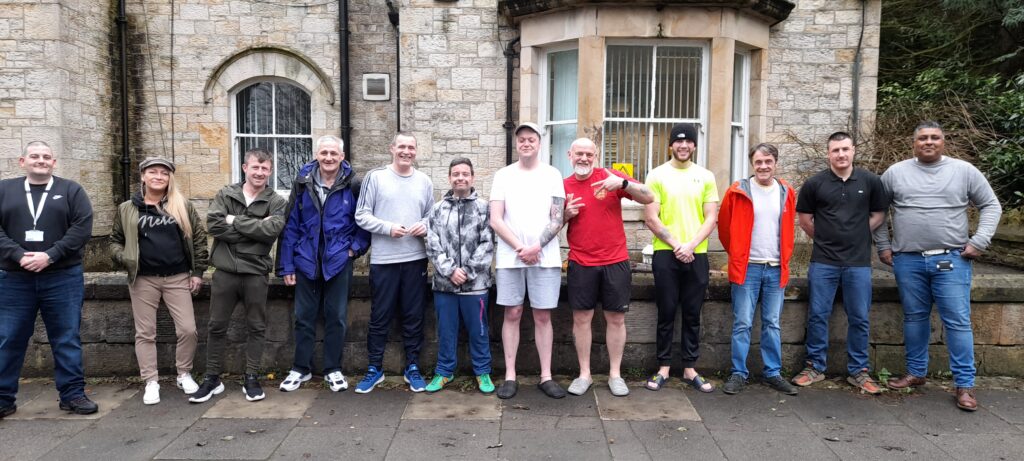 Determined group of staff and residents at Walter Lyon House who are set to take on Scafell Pike